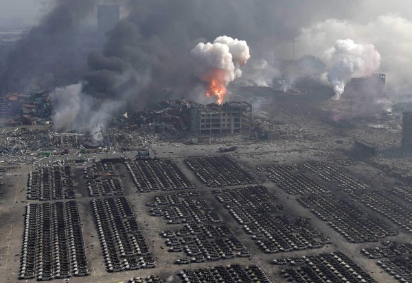 13 Aug 2015, Tianjin, Tianjin Municipality, China --- (150813) -- TIANJIN, Aug. 13, 2015 (Xinhua) -- Photo taken from a high place on Aug. 13, 2015 shows the site of huge explosions in Binhai New Area in Tianjin, north China. The blast, which occurred at a warehouse in the north China port city on Wednesday night, has killed 17 people and injured more than 400 as of Thursday morning, according to rescuers. (Xinhua/Yue Yuewei) (lfj) --- Image by © Yue Yuewei/Xinhua Press/Corbis