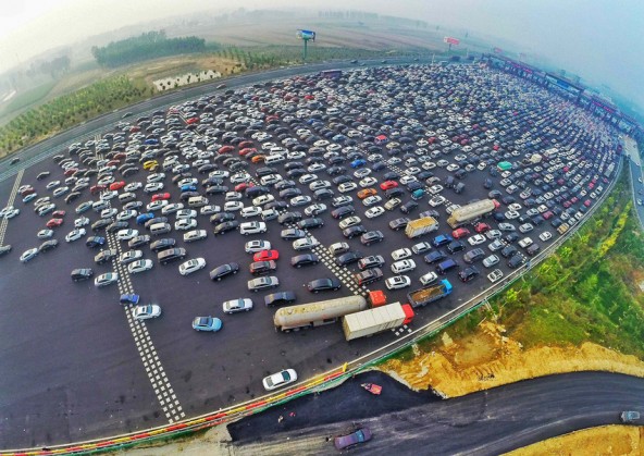 BEIJING, CHINA - OCTOBER 06: (CHINA OUT) .Travel Peak Appears On Beijing-Hong Kong-Macau Expressway At End Of Chinas National Day Holiday..Aerial view of cars queuing up to pass a checkpoint set recently in the direction of Beijing on the Beijing-Hong Kong-Macau Expressway at the end of National Day Holiday on October 6, 2015 in Beijing, China. A travel peak appeared at the end of 7-day China's National Day Holiday. .?©Whitehotpix (Credit Image: © Whitehotpix via ZUMA Press)