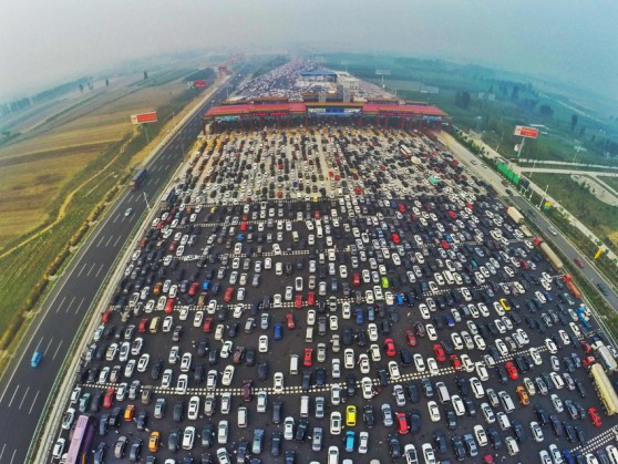 BEIJING, CHINA - OCTOBER 06: (CHINA OUT) .Travel Peak Appears On Beijing-Hong Kong-Macau Expressway At End Of Chinas National Day Holiday..Aerial view of cars queuing up to pass a checkpoint set recently in the direction of Beijing on the Beijing-Hong Kong-Macau Expressway at the end of National Day Holiday on October 6, 2015 in Beijing, China. A travel peak appeared at the end of 7-day China's National Day Holiday. .?©Whitehotpix (Credit Image: © Whitehotpix via ZUMA Press)