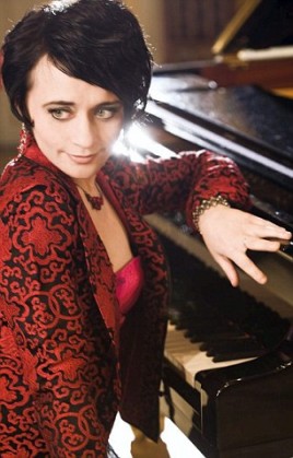 Picture of Natalie from her website. Musician John Martin has been named locally as the man being questioned on suspicion of murder after his partner Natalia Strelchenko, who was also known as Natalia Strelle, the international concert pianist she was found at their home in Manchester with multiple head injuries and died a short time later. Natalia was discovered in the early hours of Sunday after reports from neighbours that a woman had been assaulted. At around 12.45am on Sunday 30 August 2015, police and paramedics were called to an address on Culcheth Lane, Newton Heath, to reports that a woman had been assaulted. Officers attended the address and discovered 38-year-old Natalia Strelle with serious head injuries. Paramedics attempted to revive Natalia at the scene, but she sadly died a short time later. A Home Office post-mortem examination has been carried out and found that Natalia died from head and neck injuries. A 48-year-old man who was arrested yesterday on suspicion of murder remains in police custody for questioning.