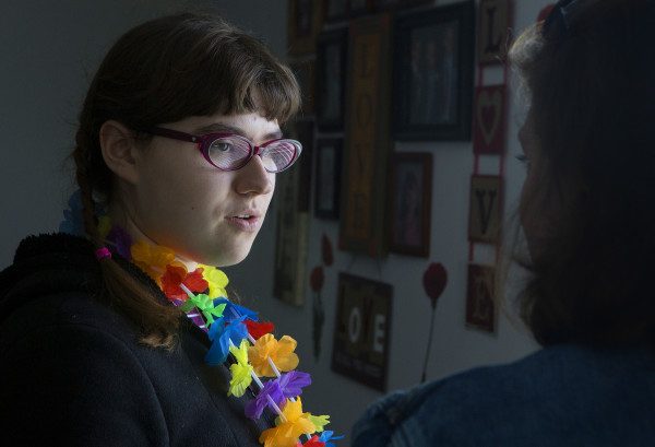 BANGOR, MAINE -- 06/10/2016 - Hallee Sorenson (left) tells her mother, Allyson Seel-Sorenson, a story in their home in Bangor Friday. Last year Sorenson invited all of her friends to her 18th birthday birthday, but no one showed up. Her mother took a photo of Hallee eating her birthday cake alone to send to family who were wondering how the party was going. Hallee?s cousin, Rebecca Prefontaine, posted the photo online with a message for people to send cards to Hallee for her 19th birthday, the post has now gone viral. Ashley L. Conti | BDN