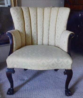 The newly upholstered chair bought for ?5 in which Angus Milner-Brown found hidden jewellery in. A couple who bought a dusty old chair for just ?5 were astonished to discover diamond jewellery worth ?5,000 hidden inside it. See CENTRE PRESS story CPBLING. Angela Milner-Brown, 50, and her husband Angus, 47, had no idea what was hidden inside the chair until years after they bought it. The couple, from Biggar, South Lanarkshire, snapped the chair up at an auction around 10 years ago for just ?5 - but could not afford to have it reupholstered. Instead, they kept it in their attic for six years, utterly unaware of the valuable secrets that were hidden inside. Angela, a scientific proofreader, said: ?We bought the chair at an auction for ?5 but that was years ago now.