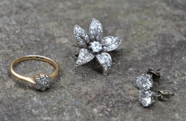 The find included a flower broche from 1890, earrings from 1900 and a ring from 1900. A couple who bought a dusty old chair for just ?5 were astonished to discover diamond jewellery worth ?5,000 hidden inside it. See CENTRE PRESS story CPBLING. Angela Milner-Brown, 50, and her husband Angus, 47, had no idea what was hidden inside the chair until years after they bought it. The couple, from Biggar, South Lanarkshire, snapped the chair up at an auction around 10 years ago for just ?5 - but could not afford to have it reupholstered. Instead, they kept it in their attic for six years, utterly unaware of the valuable secrets that were hidden inside. Angela, a scientific proofreader, said: ?We bought the chair at an auction for ?5 but that was years ago now.