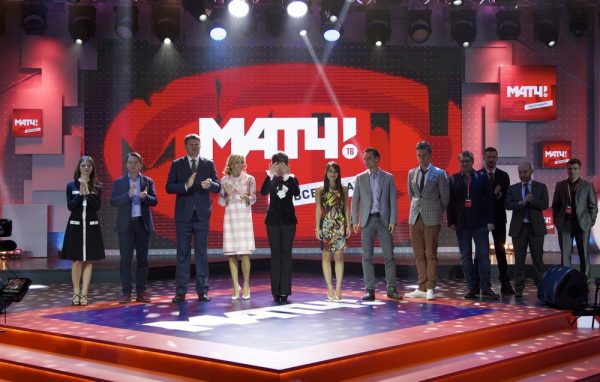 Anchors and commentators of the new Russian sports channel Match pose for the media at the presentation of the channel in Moscow, Russia, Thursday, Oct. 29, 2015. Match, part of Russian sports popularization strategy before World Cup 2018, is due to start its broadcasting on Nov. 1. (AP Photo/Ivan Sekretarev)